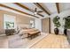 Charming main bedroom featuring exposed wood beams, a ceiling fan and neutral tones throughout at 1149 Rosecliff Dr, Waxhaw, NC 28173