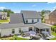 A beautiful rear exterior showcasing the patio and hot tub at 1149 Rosecliff Dr, Waxhaw, NC 28173