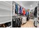Huge walk-in closet with custom shelving and plenty of space for clothing at 1149 Rosecliff Dr, Waxhaw, NC 28173