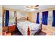 Comfortable bedroom featuring natural light, decorative accents, and a ceiling fan at 1204 N 12Th St, Bessemer City, NC 28016
