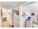 Bright hallway with wood-look floors and neutral decor, leading to other rooms at 1204 N 12Th St, Bessemer City, NC 28016