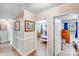Hallway showcasing entryways into bedrooms and the overall layout of the home at 1204 N 12Th St, Bessemer City, NC 28016