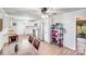 Open concept kitchen and dining area with stainless steel appliances and updated flooring at 1204 N 12Th St, Bessemer City, NC 28016