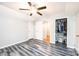 Bedroom with grey walls, updated flooring, and closet at 1276 Beechwood Dr, Newton, NC 28658