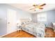 Bedroom showcasing hardwood floors, modern lighting and neutral walls at 1276 Beechwood Dr, Newton, NC 28658