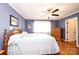 Relaxing bedroom featuring hardwood floors, a dresser, and a comfortable bed with natural light at 1276 Beechwood Dr, Newton, NC 28658