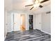 Bedroom with grey walls, updated flooring, and closet at 1276 Beechwood Dr, Newton, NC 28658