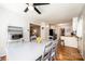 Inviting dining room featuring a large table with seating, modern ceiling fan, and hardwood floors at 1276 Beechwood Dr, Newton, NC 28658