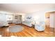 Spacious living room with hardwood floors, natural light, and comfortable seating, perfect for Gathering gatherings at 1276 Beechwood Dr, Newton, NC 28658