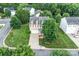 Aerial view of a two-story home with an attached garage and a well maintained lawn at 1503 Stoney Ct, York, SC 29745