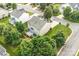 Bird's eye view of tan two-story home surrounded by mature green trees at 1503 Stoney Ct, York, SC 29745