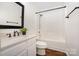 Clean bathroom featuring a shower and tub combo, a framed mirror, and a sink with white cabinets for storage at 1776 Baylor Dr, Rock Hill, SC 29732