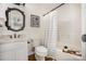 Bathroom featuring a vanity with a unique mirror and a shower-tub combo at 1776 Baylor Dr, Rock Hill, SC 29732