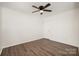 This bedroom features a ceiling fan, wood-look floors, and a neutral color palette at 1776 Baylor Dr, Rock Hill, SC 29732