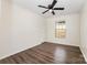 Neutral bedroom space featuring a window, a ceiling fan, and light-colored walls and flooring at 1776 Baylor Dr, Rock Hill, SC 29732