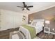 A primary bedroom boasts modern decor, a ceiling fan, and ample natural light at 1776 Baylor Dr, Rock Hill, SC 29732