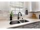 Modern kitchen features a stainless steel sink, quartz countertops, and a window with natural light at 1776 Baylor Dr, Rock Hill, SC 29732