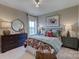 Well-appointed bedroom with lamps, dressers, and a comfortable bed at 18145 Sulton Ter, Huntersville, NC 28078