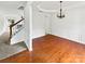 Dining room with hardwood flooring, chair railing and a chandelier at 18414 Victoria Bay Dr, Cornelius, NC 28031