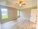Spacious bedroom featuring a ceiling fan, and two windows providing natural light at 1872 Terrain Nw Dr, Conover, NC 28613
