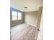 Cozy bedroom with new flooring, natural light from the window, and neutral wall colors at 1872 Terrain Nw Dr, Conover, NC 28613