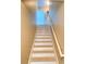Carpeted stairway leads to the upper level at 1872 Terrain Nw Dr, Conover, NC 28613