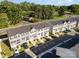 Aerial shot featuring a community of townhomes, manicured lawns, and convenient street parking at 2037 Langer St, Charlotte, NC 28214