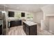 Modern kitchen with granite countertops, stainless steel appliances, and an island with seating at 2037 Langer St, Charlotte, NC 28214