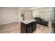 Open-concept floor plan combines a living area and dining space, perfect for modern living at 2037 Langer St, Charlotte, NC 28214