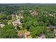 Aerial view showcasing neighborhood with tree coverage at 2255 Milton Rd, Charlotte, NC 28215