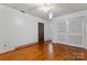 Bedroom featuring hardwood floors, a ceiling fan, and closet at 2255 Milton Rd, Charlotte, NC 28215
