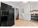 Cozy kitchen features tile flooring and stainless steel appliances, offering a functional layout at 2255 Milton Rd, Charlotte, NC 28215