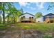 A view of the backyard featuring the deck at 253 Hall Nw Ave, Concord, NC 28027