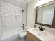 Bathroom with a tub/shower featuring classic white subway tile at 253 Hall Nw Ave, Concord, NC 28027