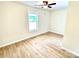 Bedroom featuring wood-look floors and a ceiling fan at 253 Hall Nw Ave, Concord, NC 28027