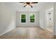 Bedroom with wood-look flooring and ensuite bathroom at 253 Hall Nw Ave, Concord, NC 28027