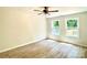Light-filled bedroom with new flooring and two windows to let in lots of light at 253 Hall Nw Ave, Concord, NC 28027