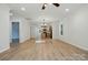 Bright, open living area featuring recessed lighting and beautiful hardwood floors at 253 Hall Nw Ave, Concord, NC 28027