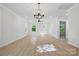Expansive living room featuring ceiling fans, recessed lighting, and hardwood floors at 253 Hall Nw Ave, Concord, NC 28027