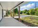 View from a covered front porch looking out over the driveway and surrounding property at 253 Hall Nw Ave, Concord, NC 28027