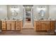 Well-lit bathroom featuring double vanities, modern fixtures, and neutral tones, creating a spa-like ambiance at 270 North St, Salisbury, NC 28147