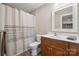 Bathroom with a single vanity, shower and tub combination at 270 North St, Salisbury, NC 28147