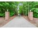 Long driveway lined by brick pillars, guides you to this inviting property at 270 North St, Salisbury, NC 28147
