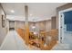 Hallway overlooking a great room with a stone fireplace at 270 North St, Salisbury, NC 28147