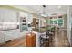 Modern kitchen with white cabinets, a large center island, and stainless steel appliances, perfect for cooking at 270 North St, Salisbury, NC 28147