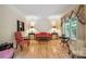 Formal living room featuring hardwood floors, ample natural light, and elegant decor at 270 North St, Salisbury, NC 28147