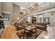 Spacious living room featuring wood floors, comfortable seating, and a staircase leading to the second floor at 270 North St, Salisbury, NC 28147