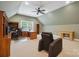 Bright office with a ceiling fan, custom cabinets, desk and a comfortable chair at 270 North St, Salisbury, NC 28147