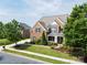 Beautiful home with manicured lawn, mature trees, and inviting curb appeal in a desirable neighborhood at 2812 Julian Glen Cir, Waxhaw, NC 28173