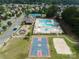 A complete picture of a community gathering place featuring a pool, a basketball court, tennis courts, and a playground at 2812 Julian Glen Cir, Waxhaw, NC 28173